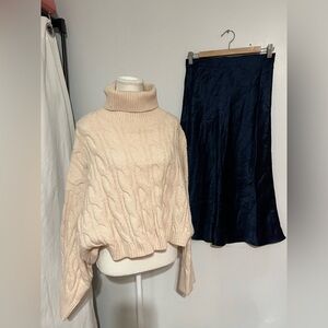 Molly Bracken Cream Cable Knit Turtleneck Sweater and Babaton Blue
skirt
